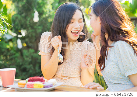 Women, eating, nature 66421726