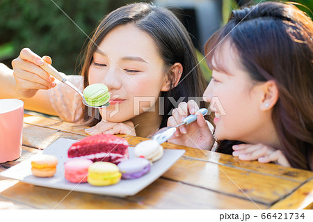 Women, eating, nature 66421734