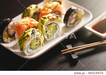 Traditional sushi roll set on plate Traditional sushi roll set on plate 66428970