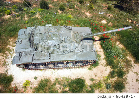 Aerial top view of a military tank. 66429717