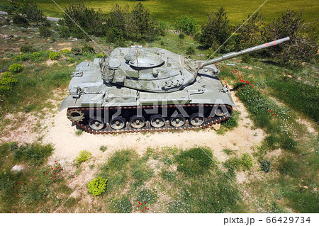 Aerial top view of a military tank. 66429734