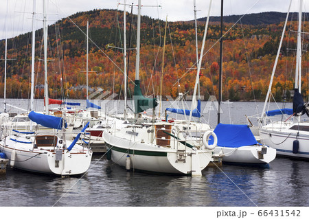 Boats on Mont Tremblant Lake in autumn, Quebec Boats on Mont Tremblant Lake in autumn, Quebec 66431542