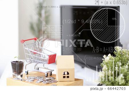 shopping online concept :Shopping Cart onthe box with paper home mock up. Shooping online delivery at home.Work desk blur background.Copyspace for text. nobody.Online Delivery.  66442703