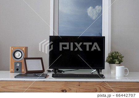 work from home. Work Table with coffee mug. blue sky with cloud at the window. work from home. Work Table with coffee mug. blue sky with cloud at the window. 66442707