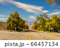 View of an empty street with Black Mountain in the background in Independence, California, USA 66457134