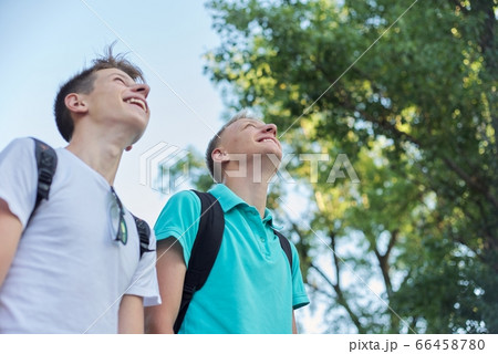 Outdoor portrait of smiling handsome young males Outdoor portrait of smiling handsome young males 66458780