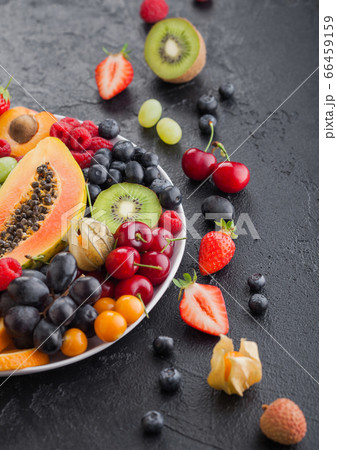 Fresh raw organic summer berries and exotic fruits 66459159