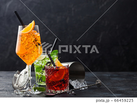 Glasses of spritz,mojito and negroni cocktails 66459225