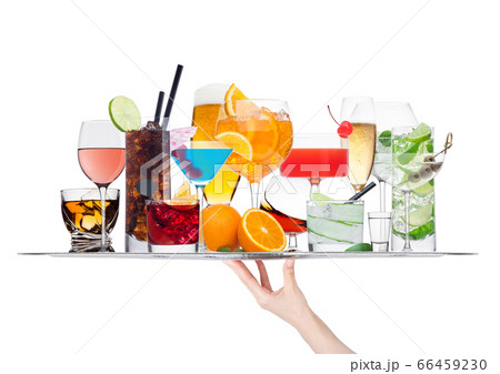 Hand holding tray with various cocktails with ice 66459230