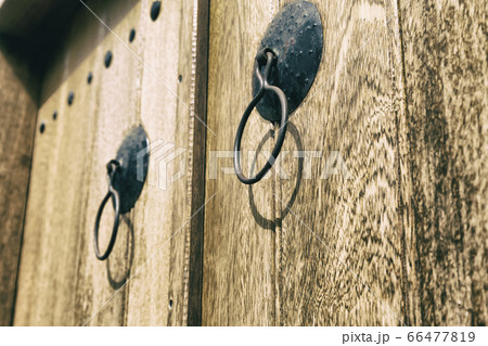 the old door and the antique rusty knocker 66477819