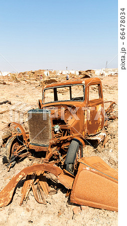 in the  old  village  rusty antique car and hot 66478034