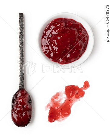 Small glass bowl and spoon of red berry jam Small glass bowl and spoon of red berry jam 66478878