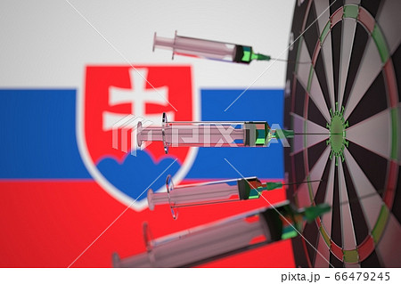 COVID-19 coronavirus disease vaccine syringes hit target against the Slovak flag. Successful research and vaccination in Slovakia. 3D rendering COVID-19 coronavirus disease vaccine syringes hit target against the Slovak flag. Successful research and vaccination in Slovakia. 3D rendering 66479245