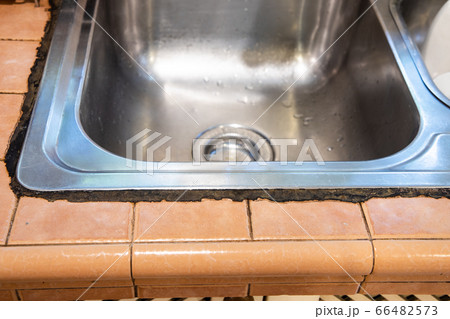 Mildew mold developed on kitchen sink silicon seal Mildew mold developed on kitchen sink silicon seal 66482573