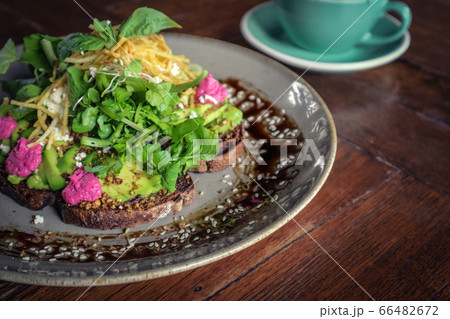 Avocado Sandwich with with beet hummus Avocado Sandwich with with beet hummus 66482672