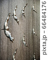 Flying men at the waterfall in the Dubai Mall 66484176