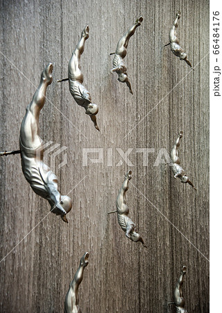 Flying men at the waterfall in the Dubai Mall 66484176