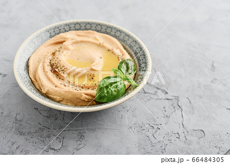 Bowl with hummus Bowl with hummus 66484305