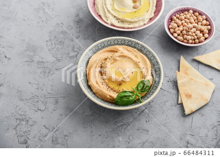 Bowls with different kinds hummus Bowls with different kinds hummus 66484311