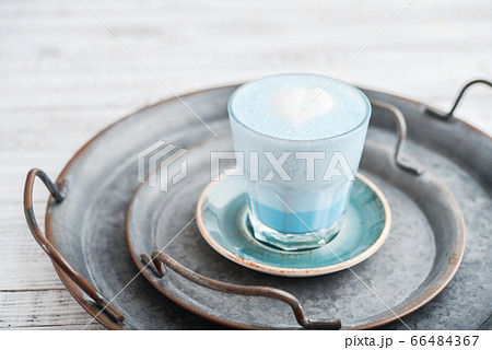 Blue matcha latte in glass Blue matcha latte in glass 66484367