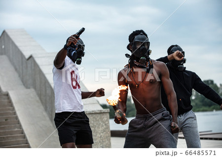 three dark-skinned people oppose anti-racism three dark-skinned people oppose anti-racism 66485571