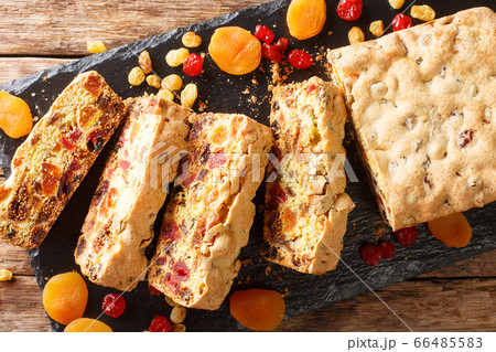 Traditional fruit cake with dried apricots berries 66485583
