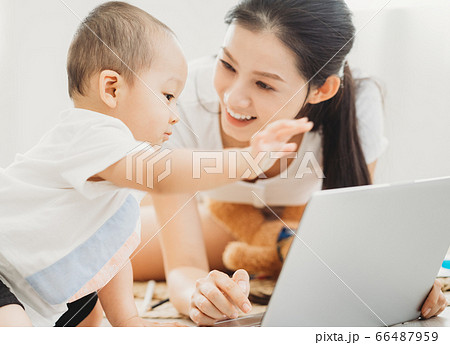 Mother and son playing at home Mother and son playing at home 66487959