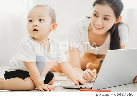 Mother and son playing at home Mother and son playing at home 66487960
