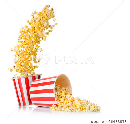 Set of flying popcorn from paper bucket and scattered popcorn isolated on white 66488833