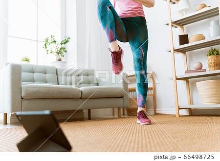 woman doing exercises at home 66498725