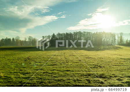 Autumn landscape with farm agricultural fields and blue sky, Austria. Autumn landscape with farm agricultural fields and blue sky, Austria. 66499719