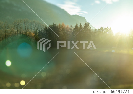 Blurred natural landscape in the sunny light in autumn day, Austria. Blurred natural landscape in the sunny light in autumn day, Austria. 66499721