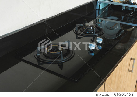 Photo of street kitchen room with black gas stove 66501458