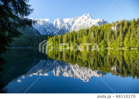 Beautiful morning scene with alpine peaks at sunrise Beautiful morning scene with alpine peaks at sunrise 66510270