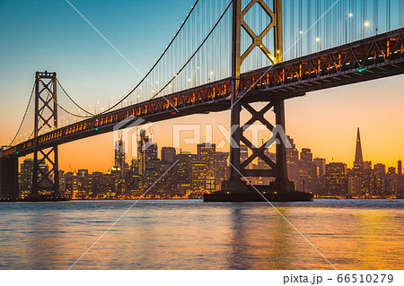 San Francisco skyline with Oakland Bay Bridge at sunset, USA San Francisco skyline with Oakland Bay Bridge at sunset, USA 66510279