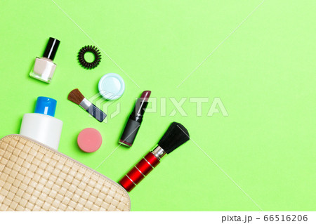 Aerial view of a leather cosmetics bag with make Aerial view of a leather cosmetics bag with make 66516206