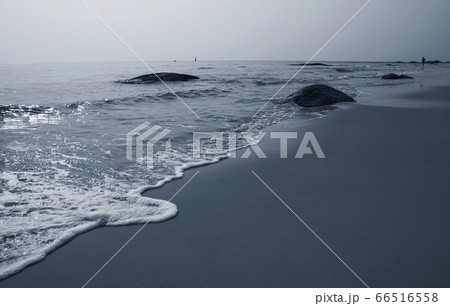Sad concept of Lonely woman walking on the beach 66516558