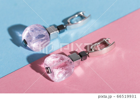 Women's Jewelry. Trendy jewelry on coloured background. Flat lay, top view. Women's Jewelry. Trendy jewelry on coloured background. Flat lay, top view. 66519931