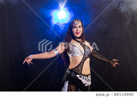 Young woman belly dancer in exotic dress with...の写真素材 [66519990] - PIXTA