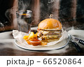 Tasty smoked Burger on plate 66520864
