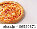Fresh Italian cheese pizza on white wooden background 66520871