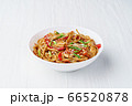 Udon noodles with chicken on white wooden background 66520878