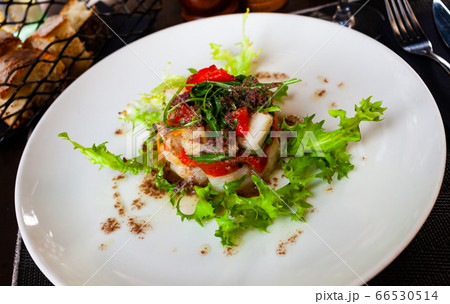 Cod timbale with roasted red peppers and arugula 66530514