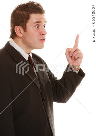 Furious teacher or business man shaking finger Furious teacher or business man shaking finger 66540607