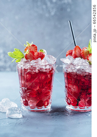 Red cocktail with ice and mint Red cocktail with ice and mint 66542856