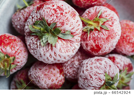 Frozen strawberry with crystals of ice Frozen strawberry with crystals of ice 66542924