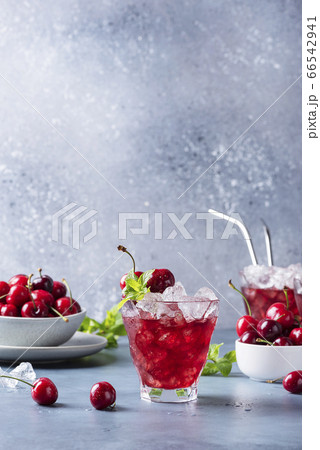 Summer alcholic coktail with cherry Summer alcholic coktail with cherry 66542941