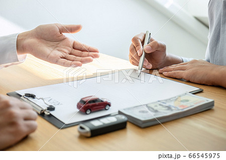 Car rental and Insurance concept, Young salesman Car rental and Insurance concept, Young salesman 66545975