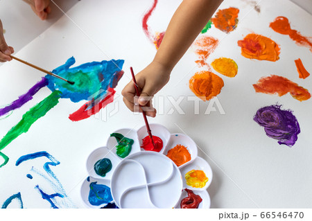 Child paint with watercolors. Education concept. Child paint with watercolors. Education concept. 66546470