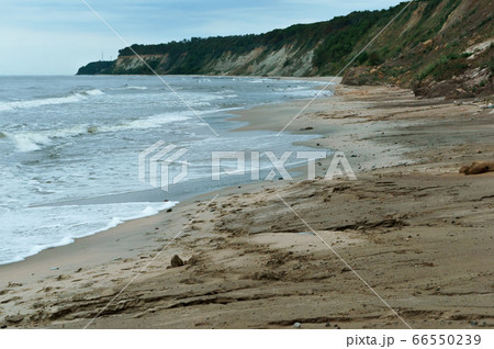 steep coast of the sea, landslides and destruction steep coast of the sea, landslides and destruction 66550239